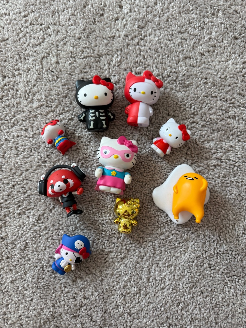 Hello Kitty Sanrio Figure Set in Red, Pink, Gold, Black, White, Blue